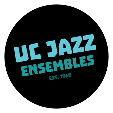 Black circle with bold blue text reading UC Jazz Ensembles and below it in smaller text Est. 1968.